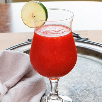 A frozen mixture of rolanberry juice and rum, brightened by a zesty dash of lemonette essence and a splash of blood currant soda.